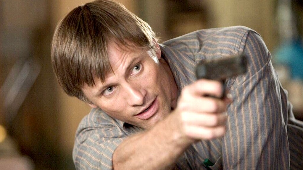 Viggo Mortensen pointant une arme dans A History of Violence.